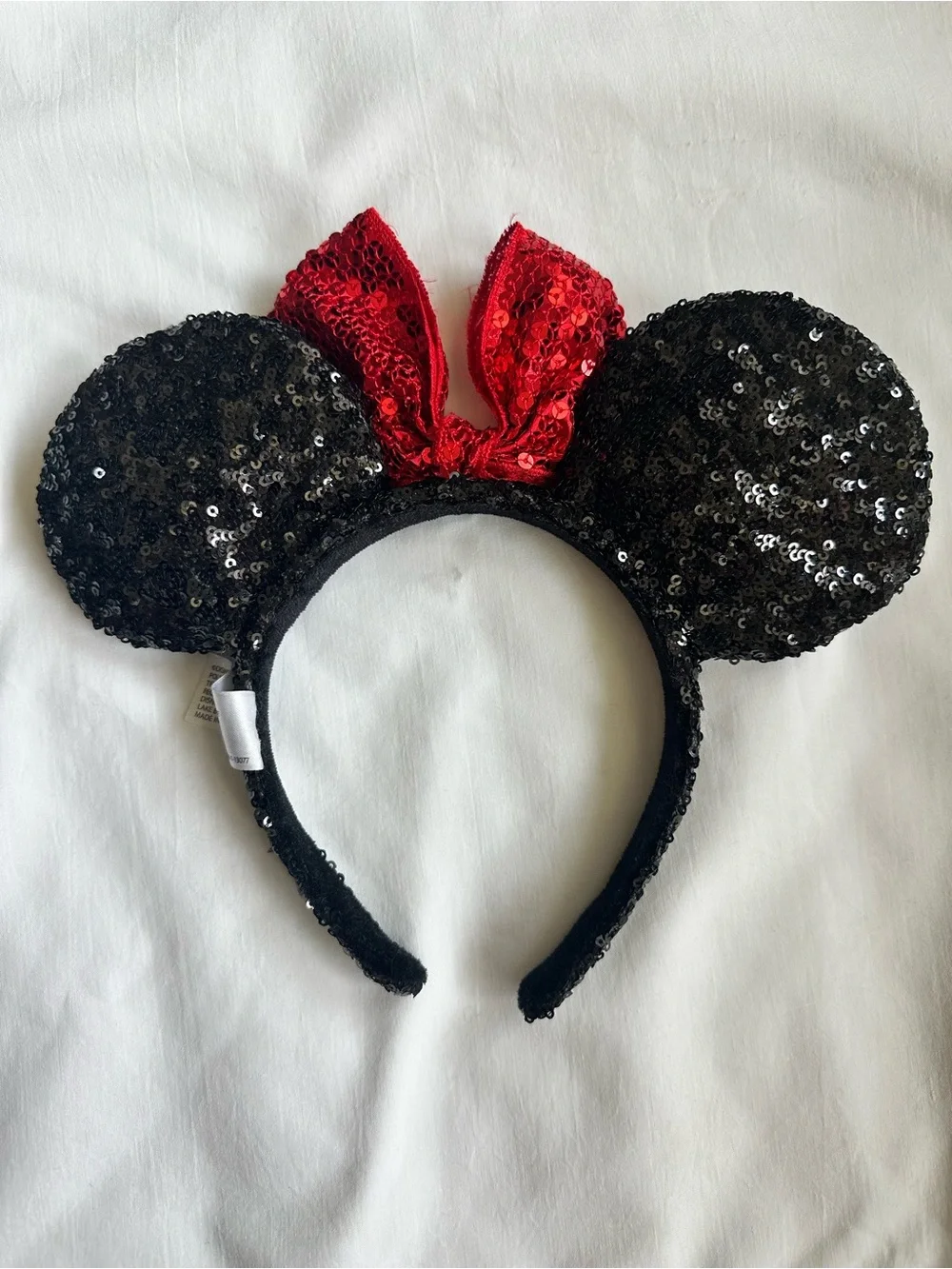 Official Disney Parks Sequin Minnie Ears Headband with Red Bow- Black & Red